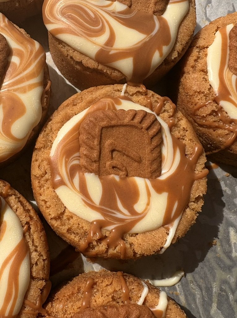 Biscoff cookie cups with a white chocolate and caramel swirl